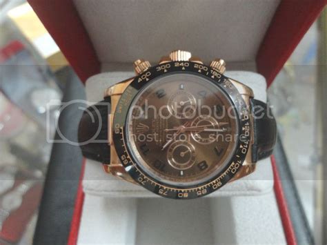 rolex daytona 3131 18k price